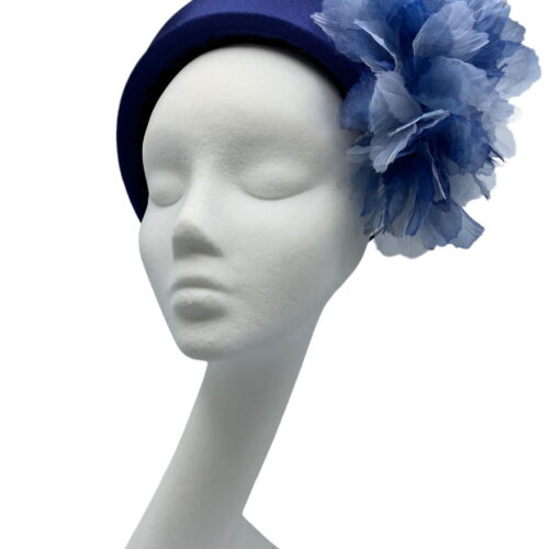 Navy bandeau crown with fabulous flower detail.